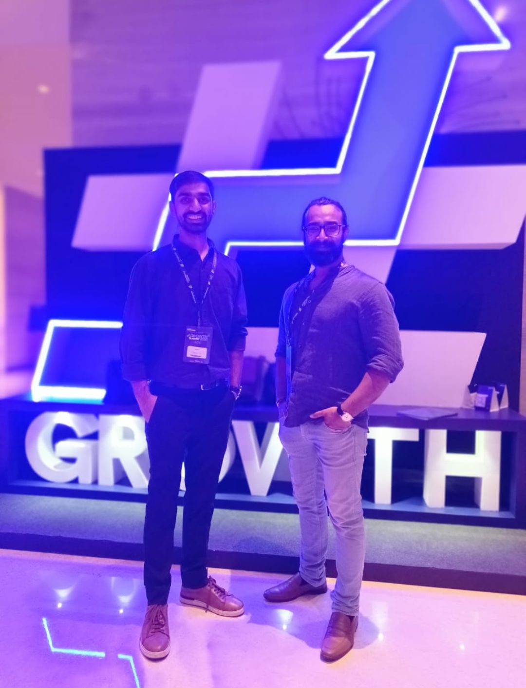Sachin Upadhyay at the GrowthX Summit conference stage backdrop